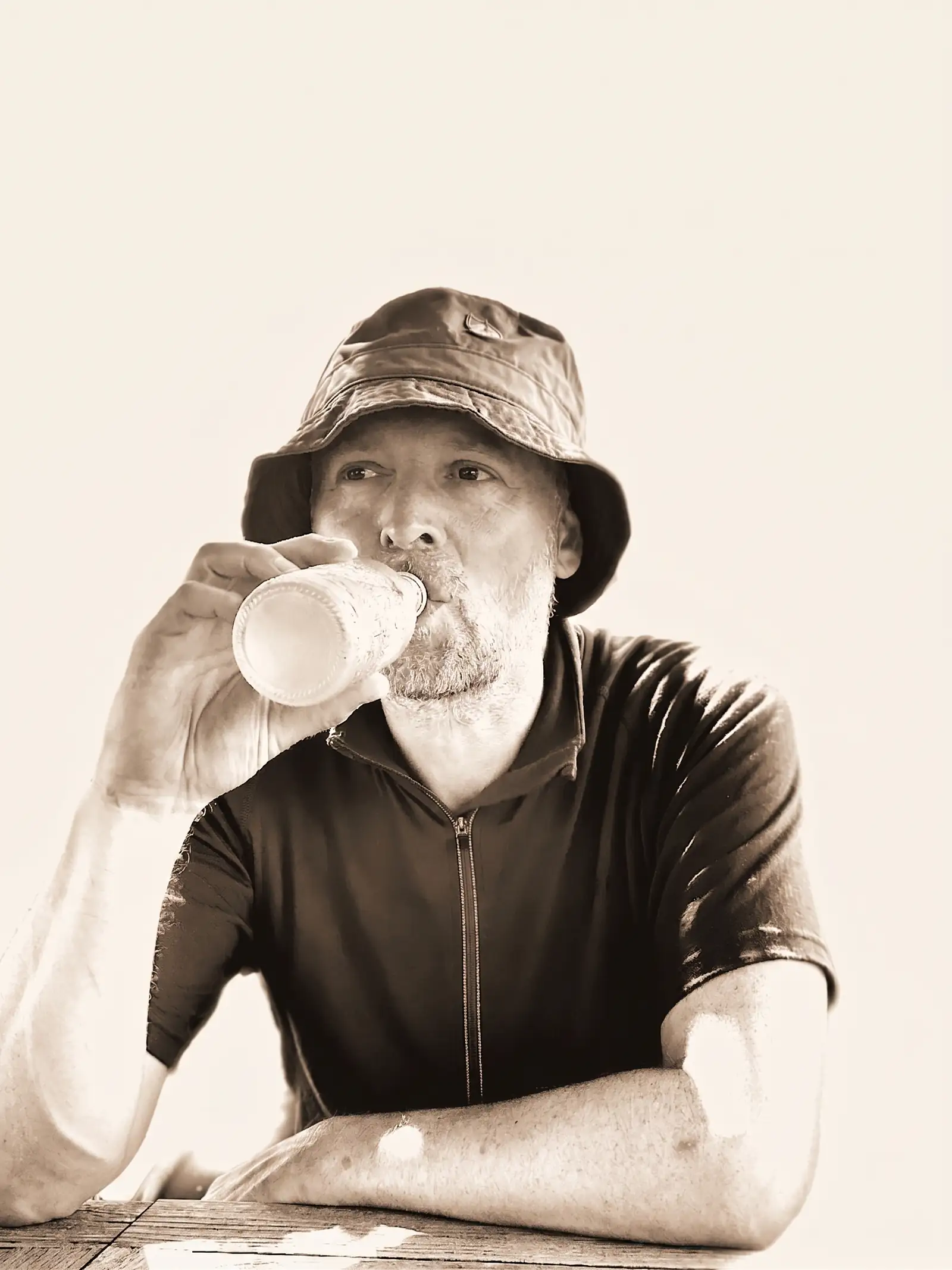 Jamie drinking out of a bottle.