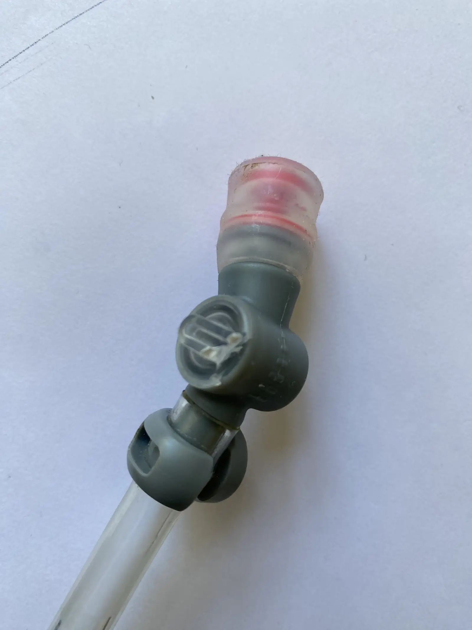 A broken Osprey hydration hose